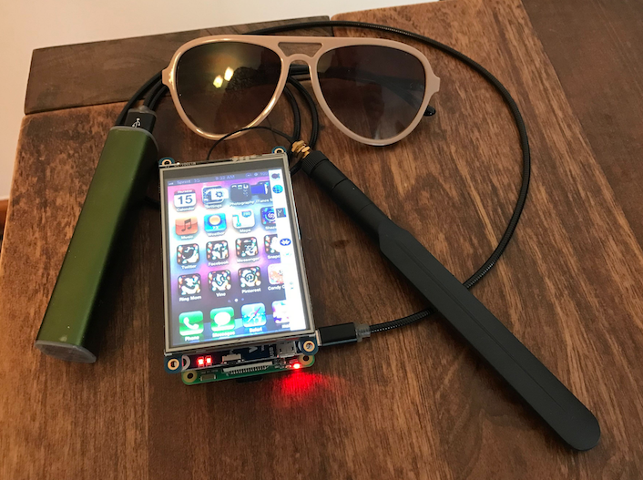 My homemade cell phone, with sunglasses for scale